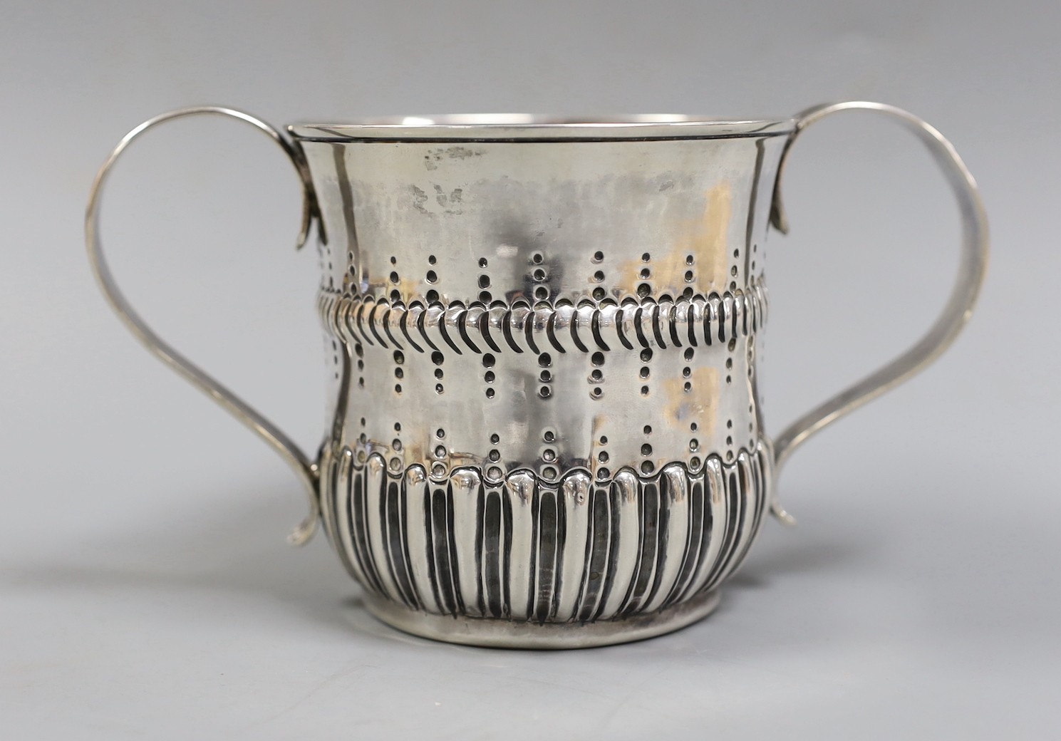 An early George III demi-fluted silver porringer, by John Moore, London, 1761, height 85mm, 7.2oz, with contemporary engraved date.